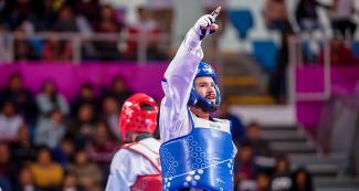 Andres Molina from Costa Rica celebrates his victory against Brazil in Lima 2019 men’s Para taekwondo K44 -75 kg at the Callao Regional Sports Village.