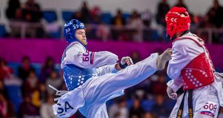 Francisco Pedroza from Mexico and Evan Medell from the USA compete in the men’s Para taekwondo K44 +75 kg final at the Callao Regional Sports Village.
