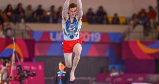 Robert Neff from the US about to jump in the men’s artistic gymnastics competition at Lima 2019, in the Villa El Salvador Sports Center.