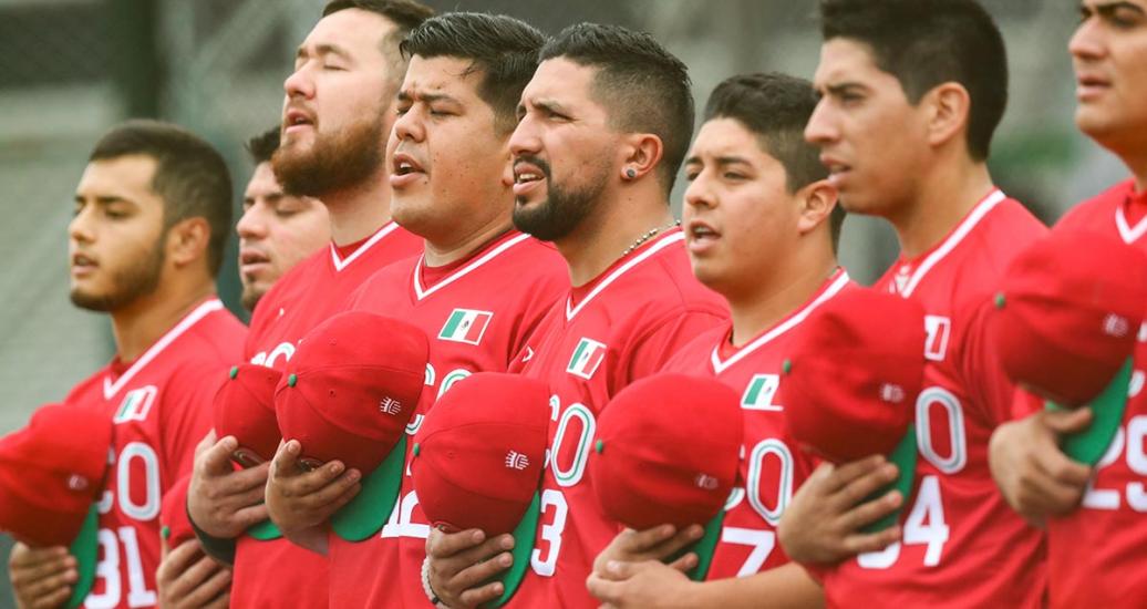 Mexican team singing their national anthem before the softball competition