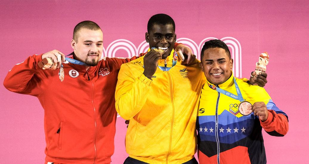 Boady Santavy, Jhonatan Rivas and Keydomar Vallenilla showing medals won at Lima 2019 Games