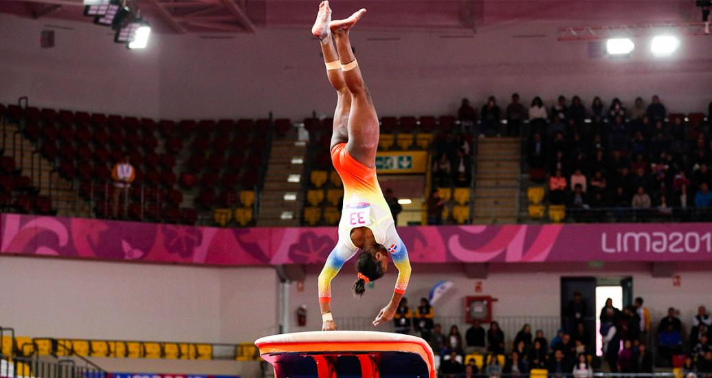 Dominican Republic gymnast Reagan Pena over the vaulting table