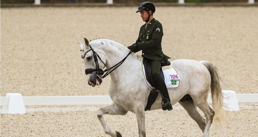 Brazil’s Joao Marcali on His White Horse During Competition