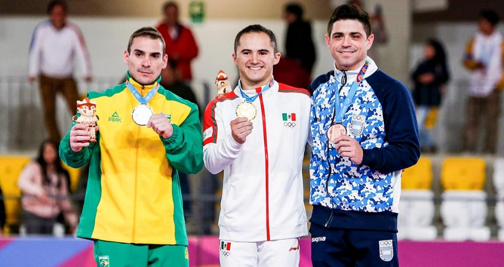 Brazilian Arthur Zanetti (silver), Mexican Fabian de Luna (gold), and Argentinian Federico Molinari (bronze) at the Lima 2019 Games