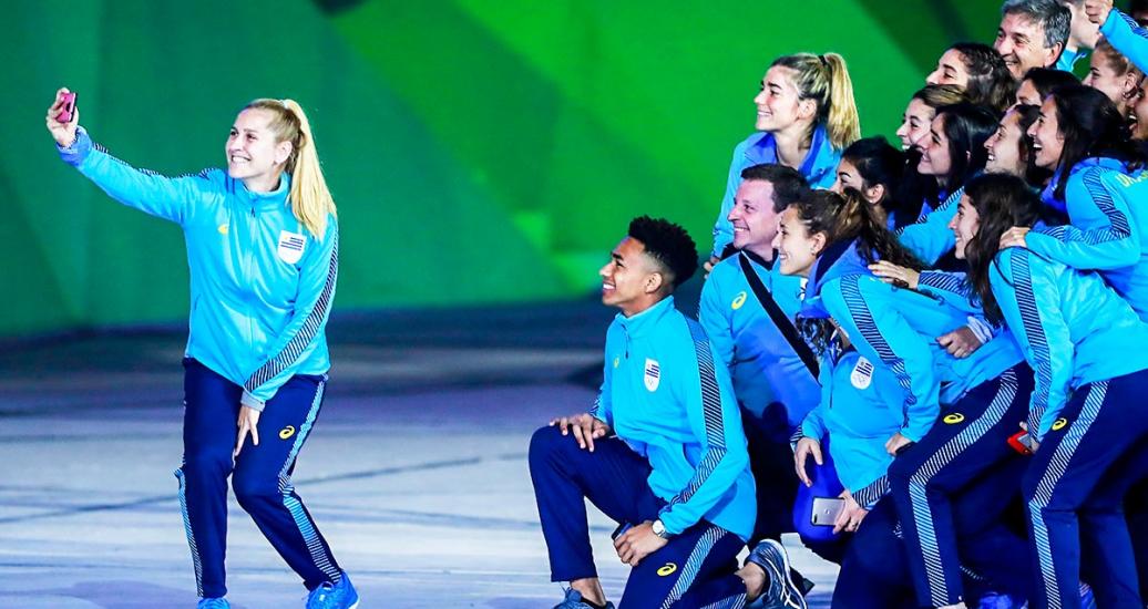 Uruguayan athletes taking selfies during the Opening Ceremony