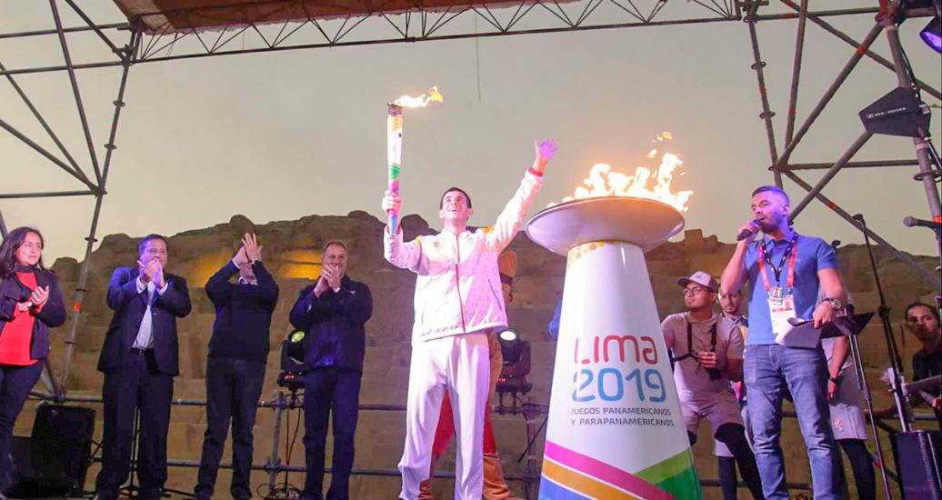 Peruvian Para badminton player Pedro Pablo de Vinatea carries the Lima 2019 Parapan American Games torch. 