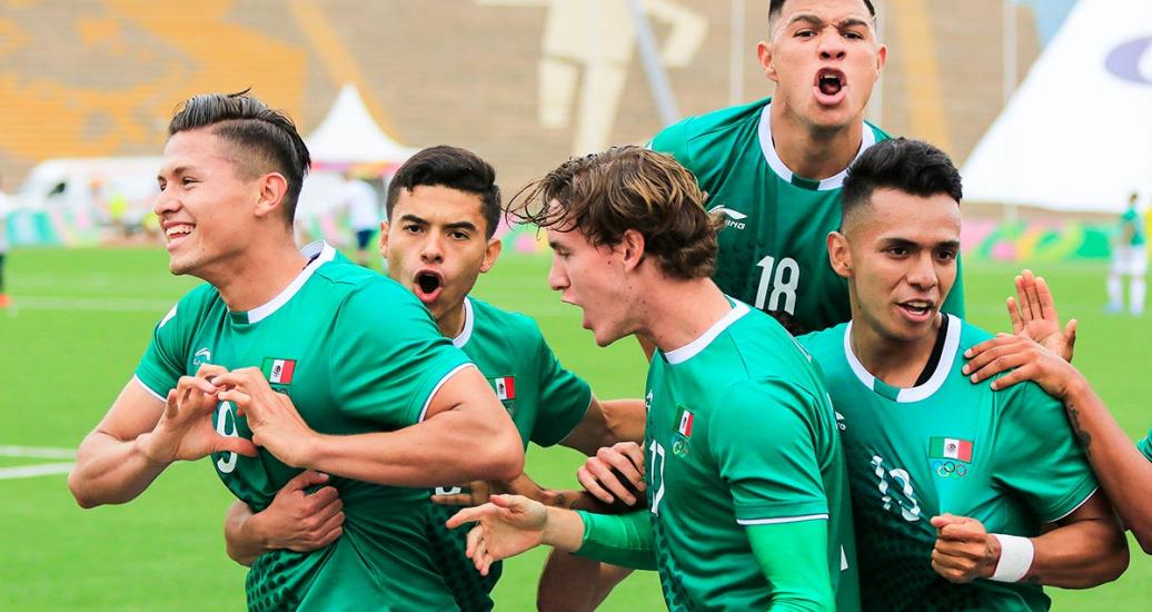 Mexican team players celebrate their victory at the 2019 Pan American Games football competition at the stadium of the National University of San Marcos.