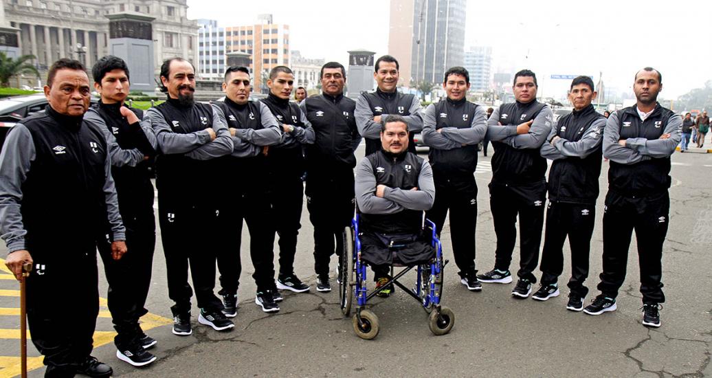 Male Para athletes pose outside the presentation ceremony of the Peruvian delegation for the Lima 2019 Parapan American Games