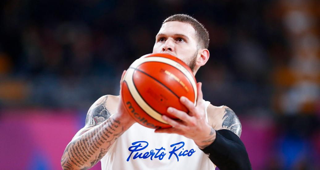 Benito Santiago from Puerto Rico faces off against Dominican team in the Lima 2019 basketball semifinal held at the Eduardo Dibós Coliseum