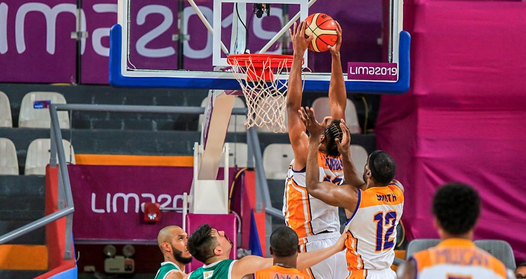 Jason Perry from Virgin Islands scores a point against Mexico in the Lima 2019 basketball competition at Eduardo Dibós Coliseum