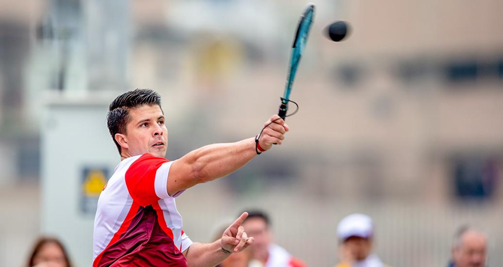  Peruvian fronton player Cristopher Martínez about to strike the ball back to Mexican Isaac Pérez during fronton qualification at the Villa María del Triunfo Sports Center, at the Lima 2019 Pan American Games