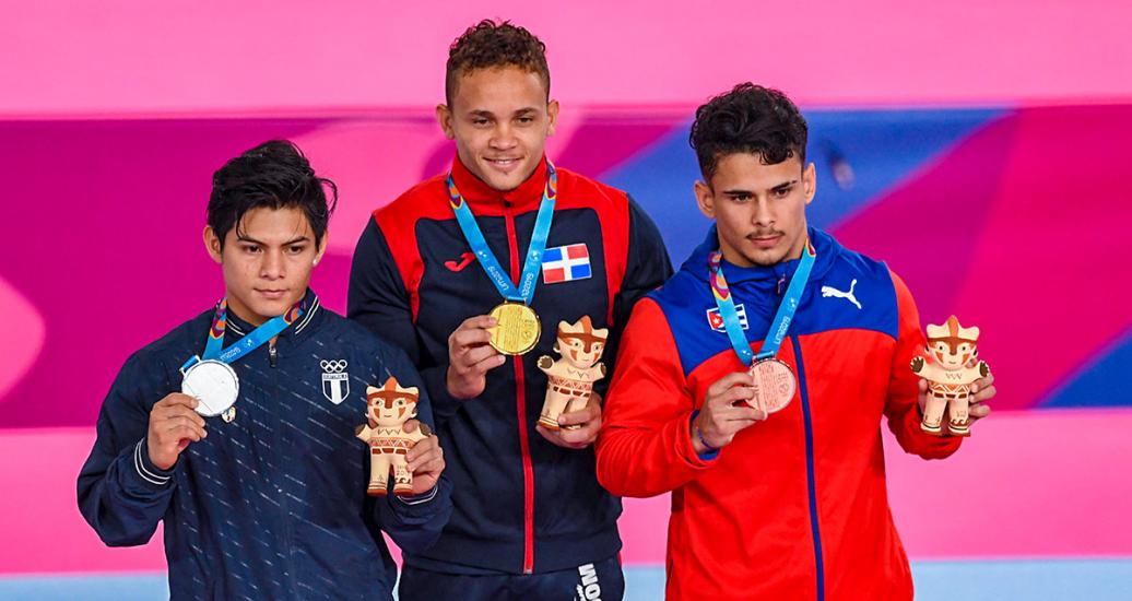 Guatemalan Jorge Alfredo Vega (silver), Dominican Audry Nin (gold) and Cuban Alejandro de la Cruz (bronze), medalists in artistic gymnastics vault events at the Lima 2019 Games