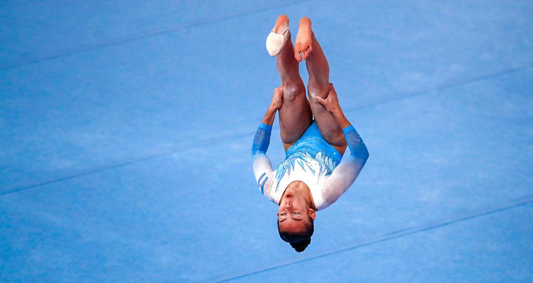 Argentinian gymnast Abigail Magistrati during the artistic gymnastics floor exercise competition at the Villa El Salvador Sports Center Título: Argentinian gymnast Abigail Magistrati during her floor exercise performance at Lima 2019