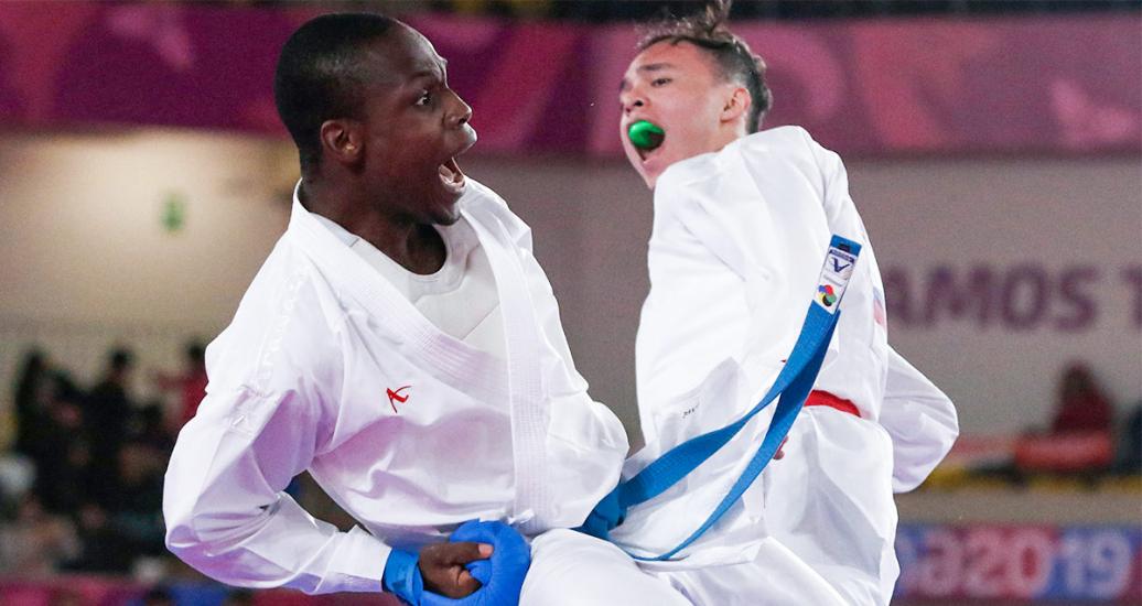 Colombian Carlos Sinisterra faces off Mexican Alan Cuevas in the men’s karate 84 kg event held at the Lima 2019 Villa El Salvador Sports Center.