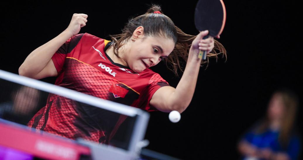 Neridee Niño hits the ball in match against Brazil in the Lima 2019 Games mixed doubles competition at the National Sports Village – VIDENA